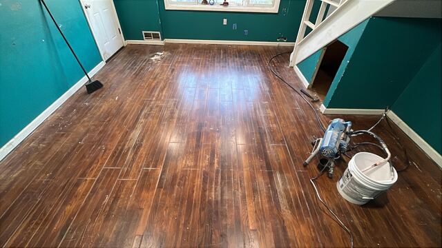 Before refinishing — scratched, dull floor in FairFax, Virigina home