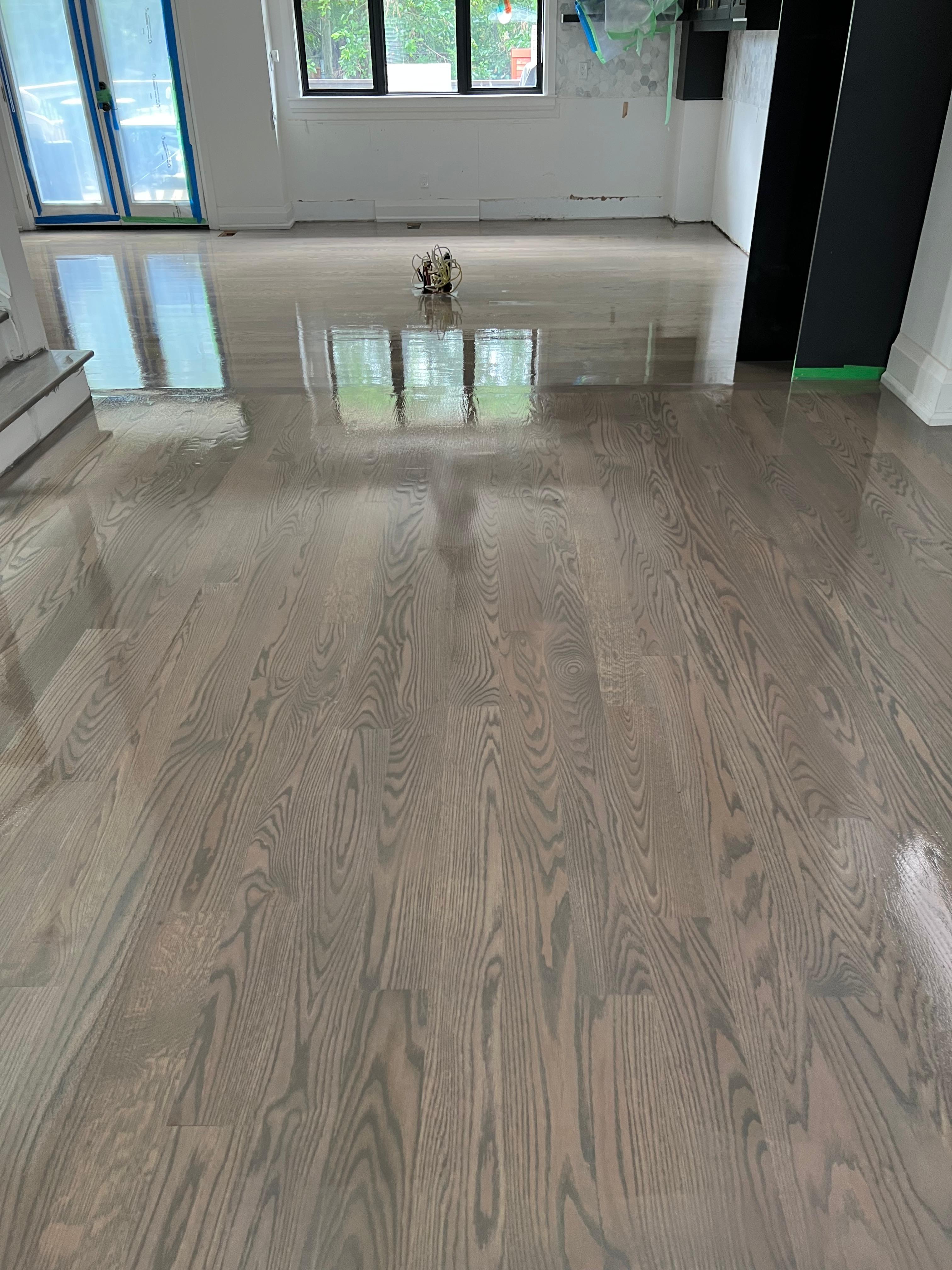 Wide plank hardwood floor refinished and sanded with hardwood repairs in Maryland home