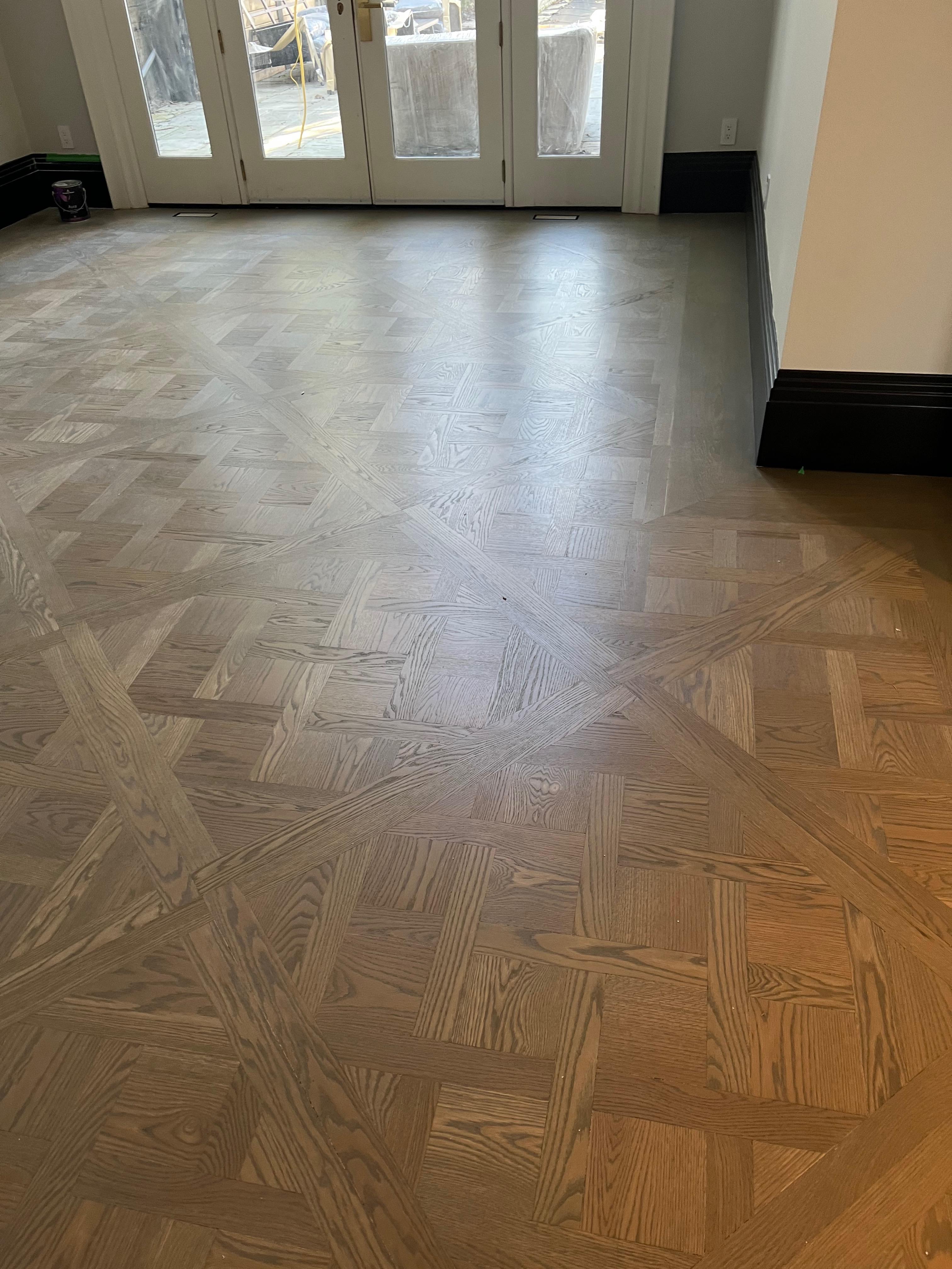 Sanded and refinished stairs with new pickets installed in Arlington, Virginia home