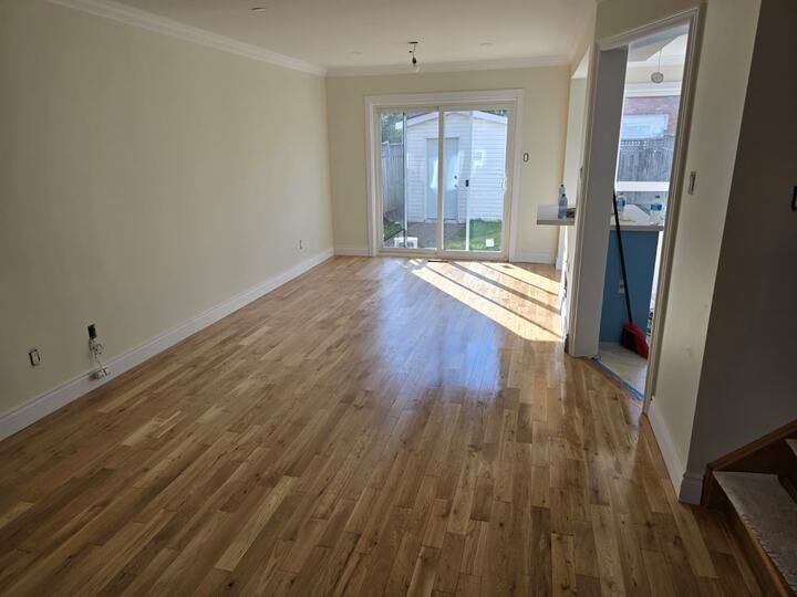 Refinished hardwood floor with rich tone in apartment in Bethesda, Maryland