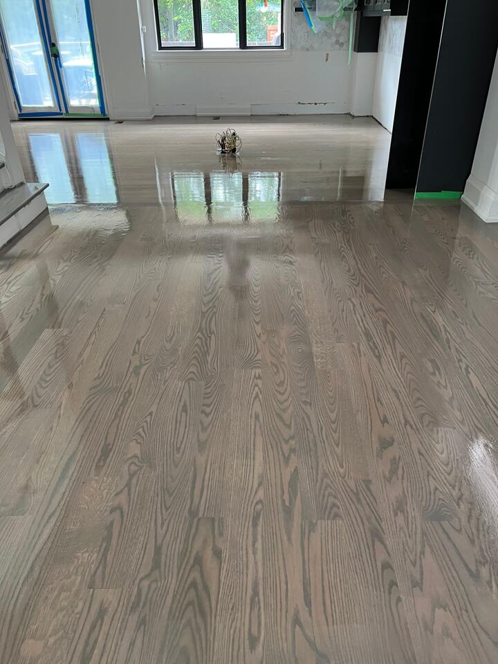 Wide plank hardwood floor refinished and sanded with hardwood repairs in Maryland home