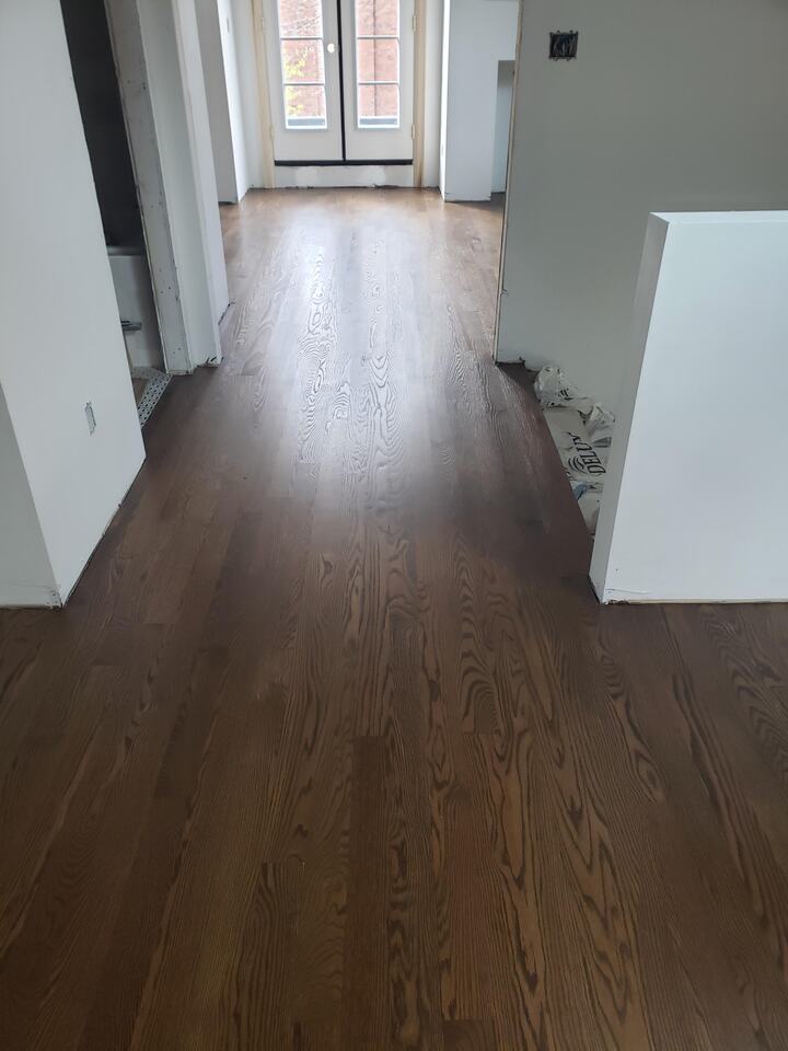 Shiney Gloss refinish in Kitchen with reflective lighting in Huntington, Virginia home