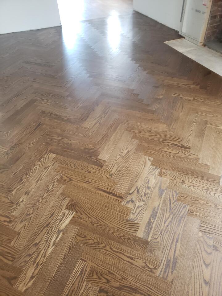 Refinished oak floor with dark stain and satin finish in West Falls Church, Virginia home