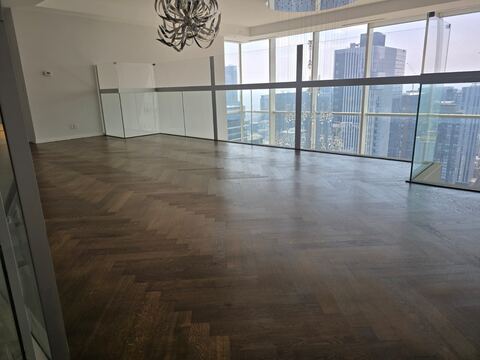 Freshly refinished hardwood floor with rich tone in apartment in Arlington, Virginia