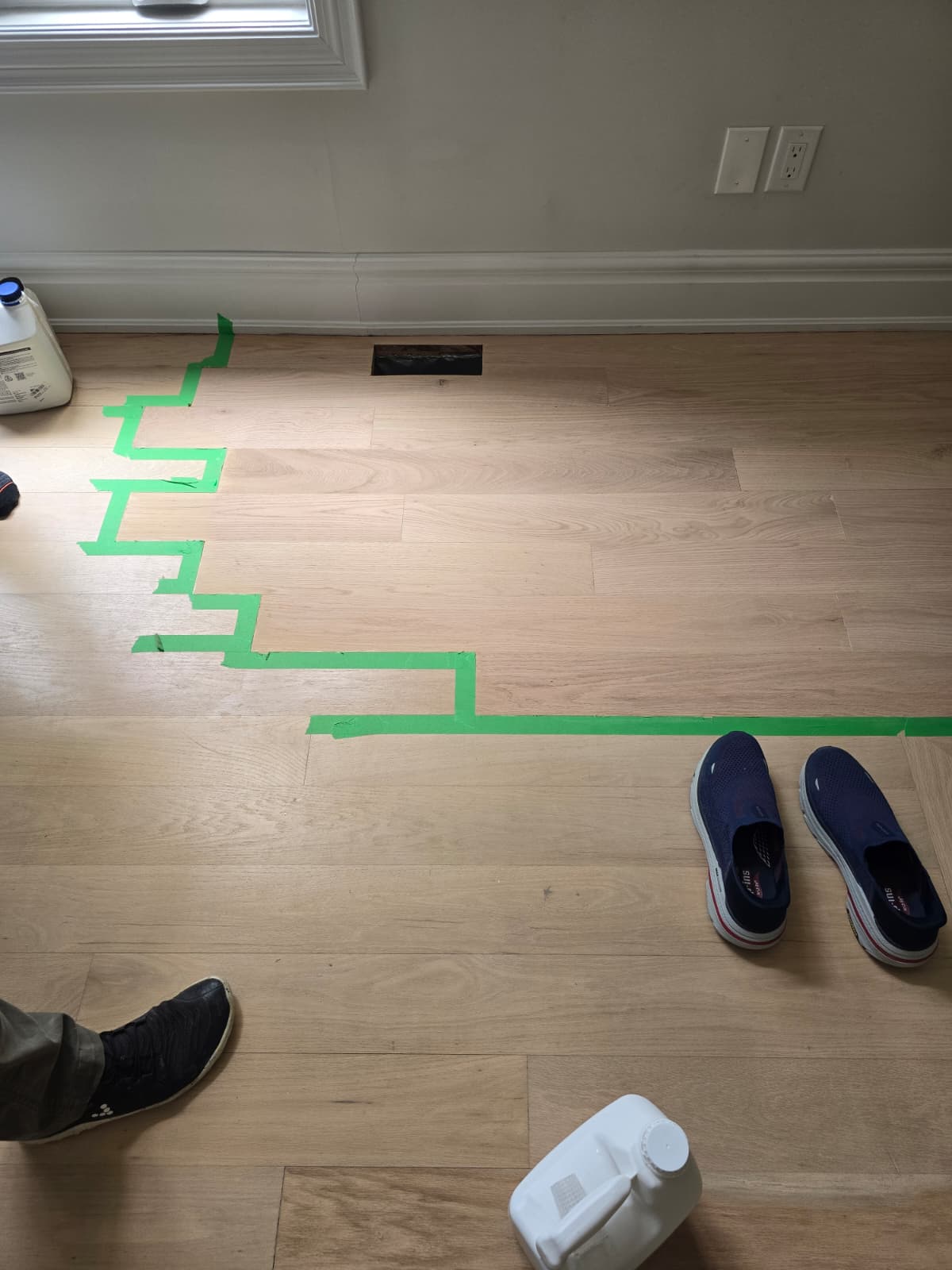 Board replacement blended into existing pattern on hardwood floor in Washington, DC home